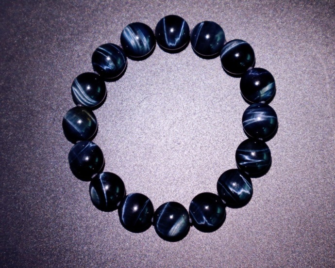 鹰眼石7373绝美的蓝光猫眼犹如极光艳彩一样