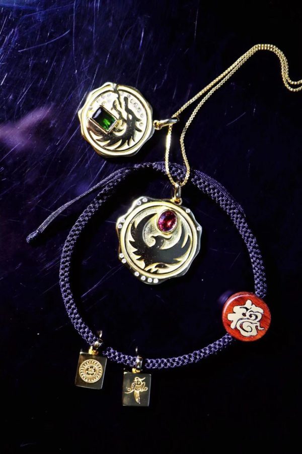 给双胞胎定制的一对碧玺龙凤宝宝牌-菩心晶舍